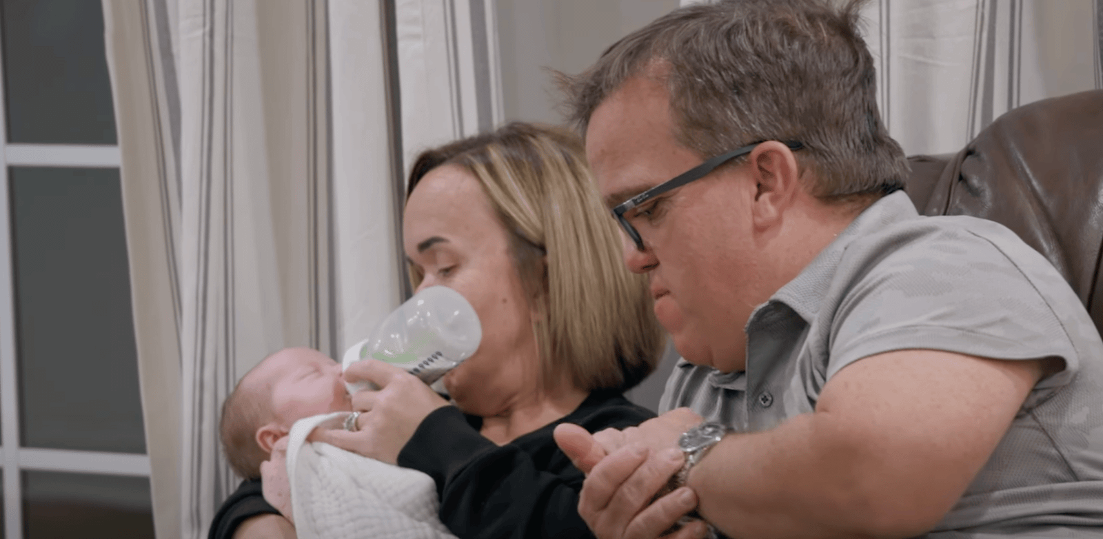 Amber Johnston feeding baby Leighton with Trent watching