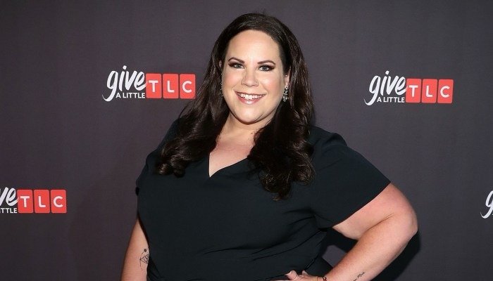 Whitney Way Thore smiling at a TLC event