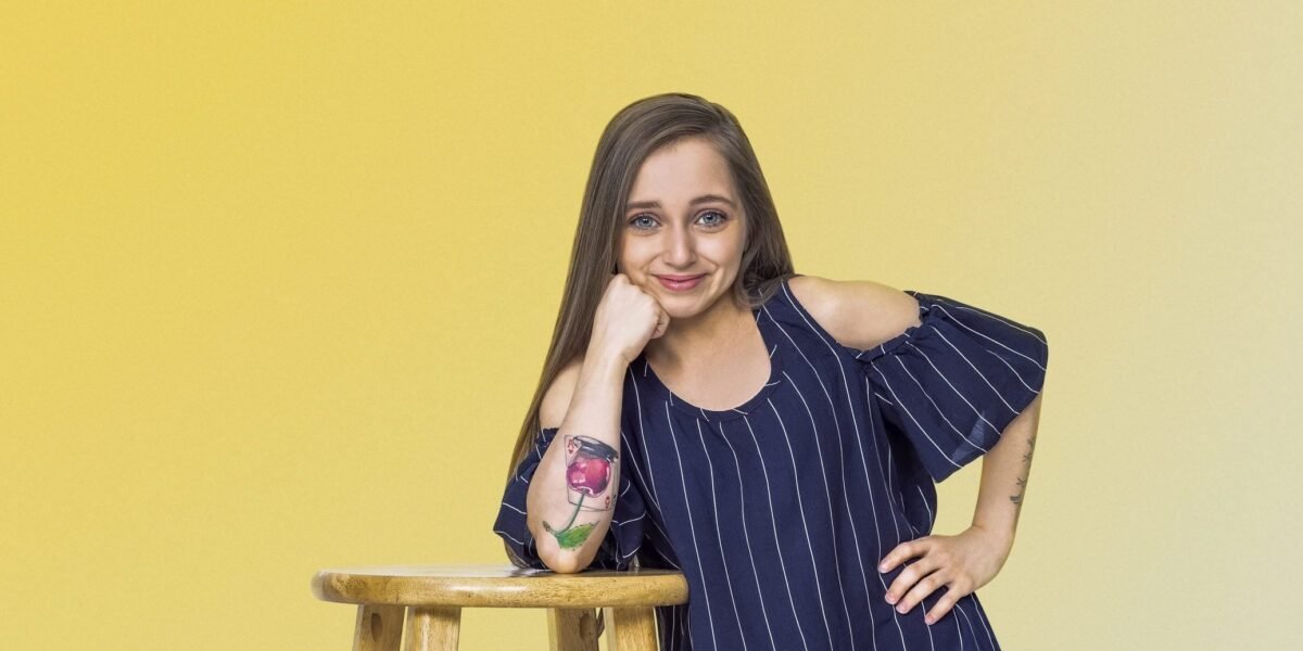 Shauna Rae in TLC press photo on yellow background