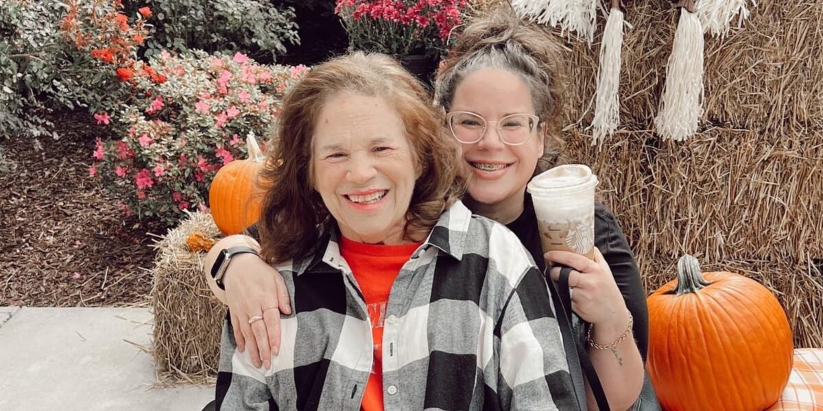 Whitney Way Thore smiling with her late mother Babs in a fall photo