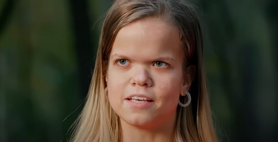Anna Johnston looking serious outdoors