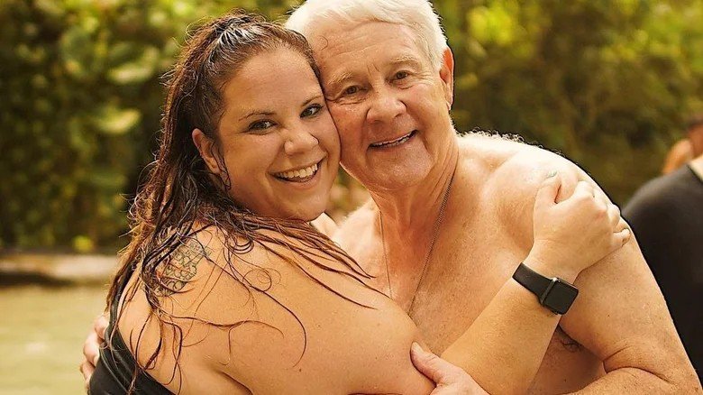 Glenn Thore and Whitney Way Thore smiling together on a family outing