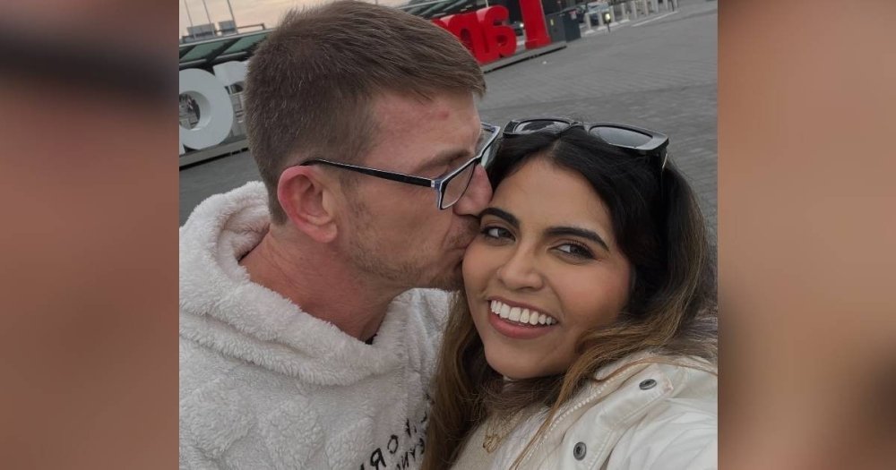 Jonathan Pearce kisses Ally's cheek in a candid selfie