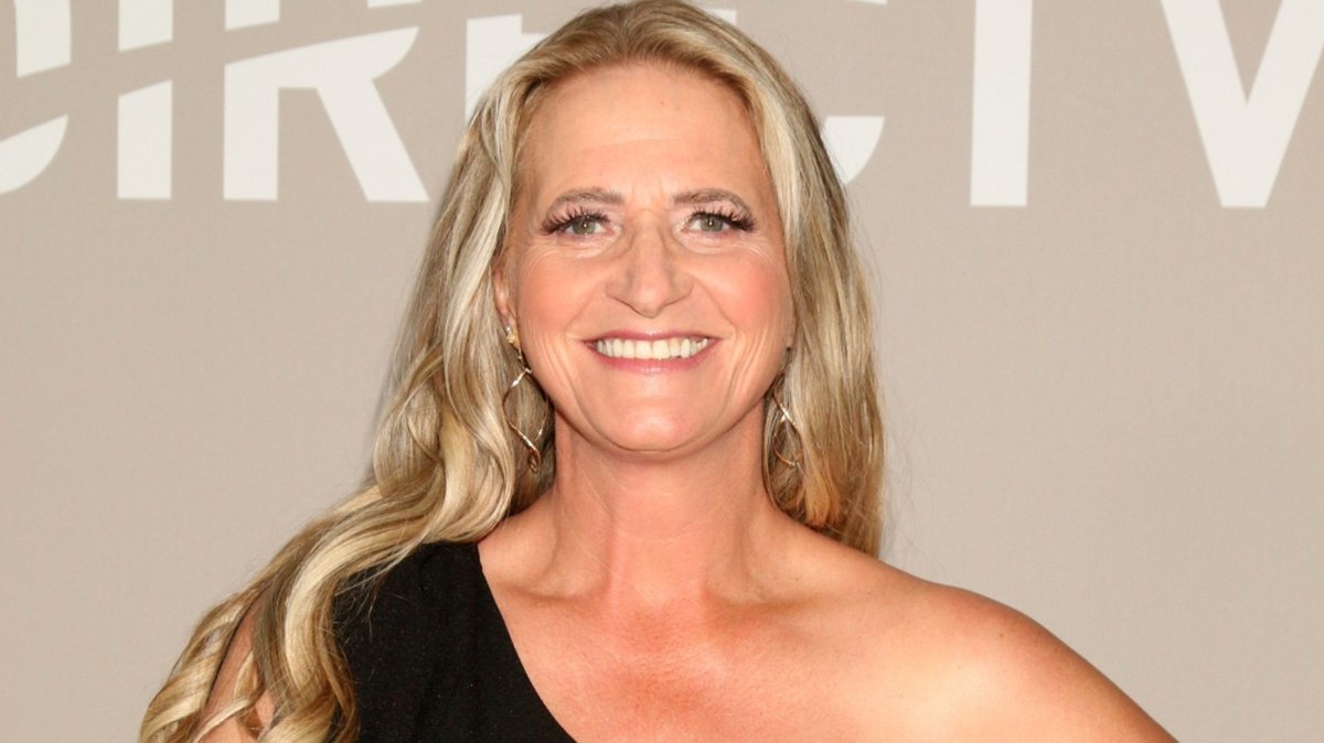 Christine Brown smiling on the red carpet
