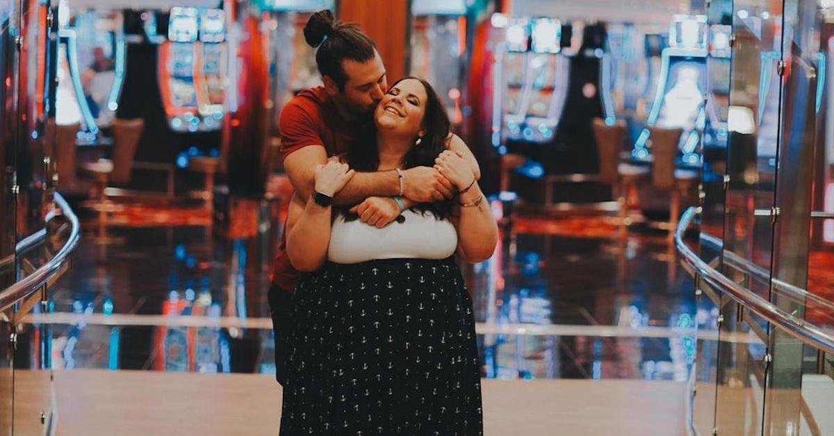 Whitney Thore and Chase Severino kissing in a casino
