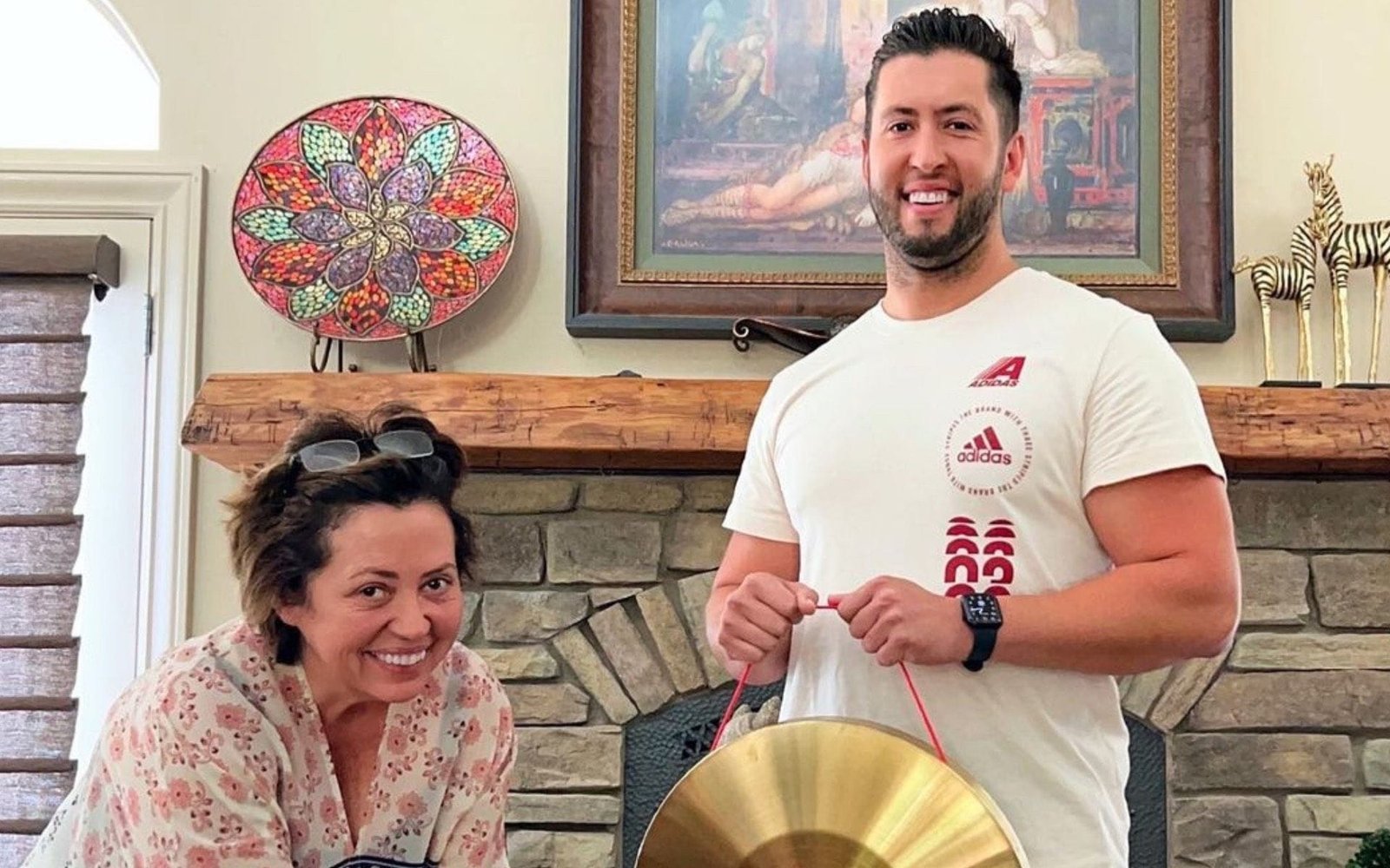 I Love a Mama's Boy cast member with his mother smiling at home