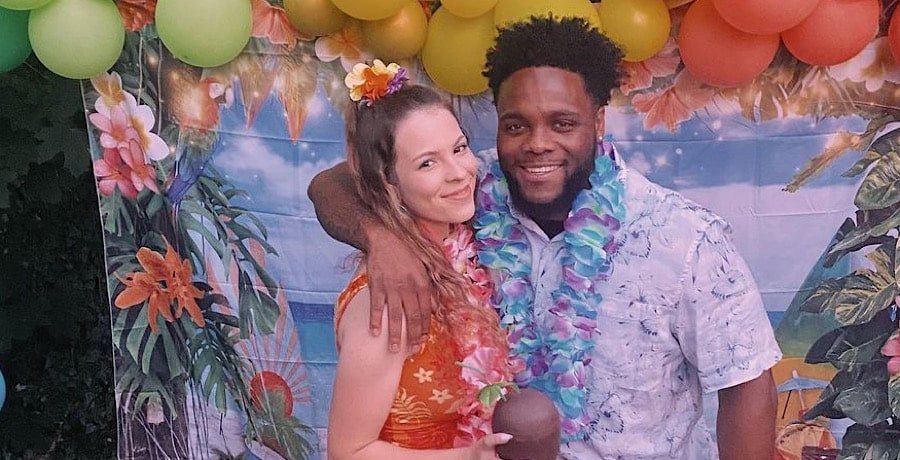 Lilly Bennett and Lawrence Bishop smiling together
