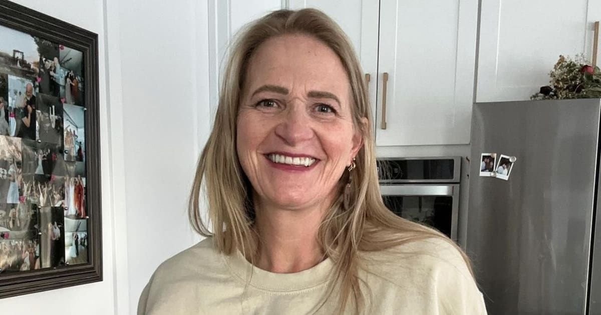 Christine Brown smiling in kitchen