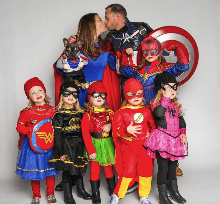 The Busby family dressed as superheroes for Halloween
