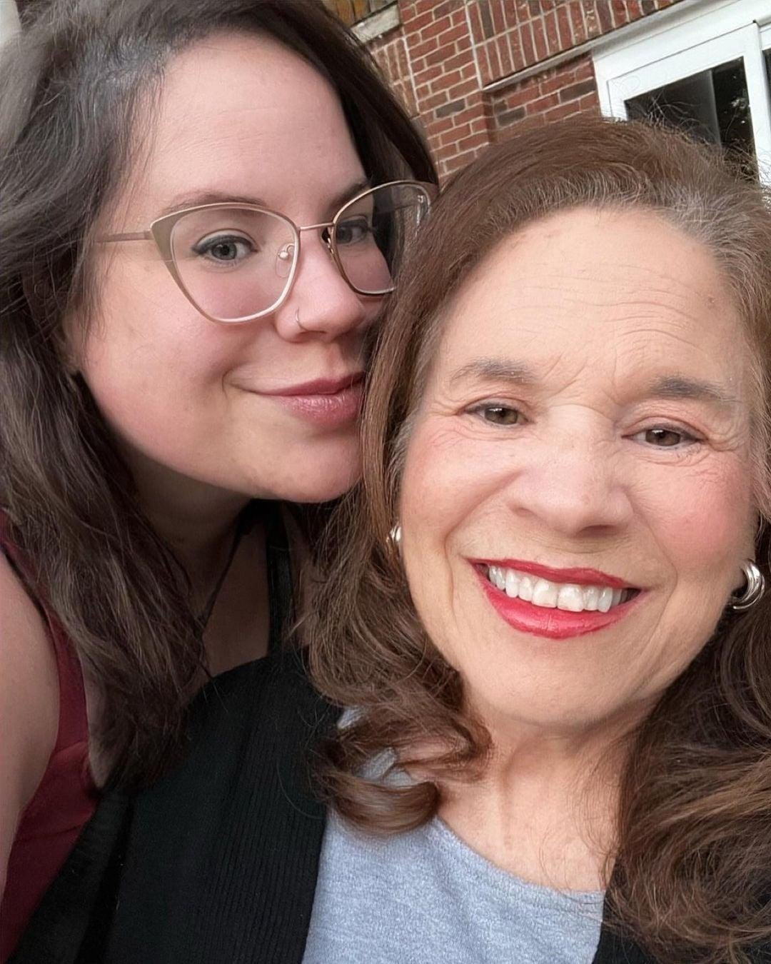 Whitney Thore kissing her mom Babs Thore's cheek