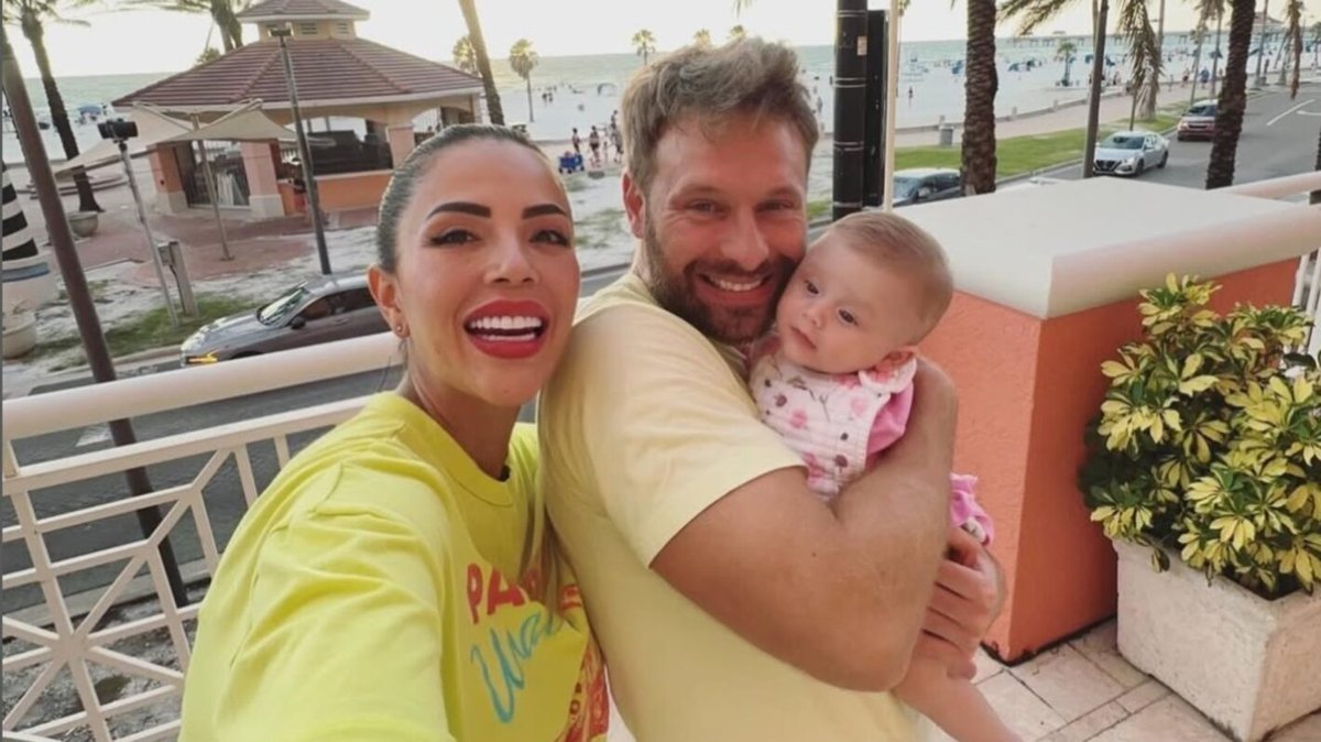 Jasmine, Matt, and baby Matilda at the beach