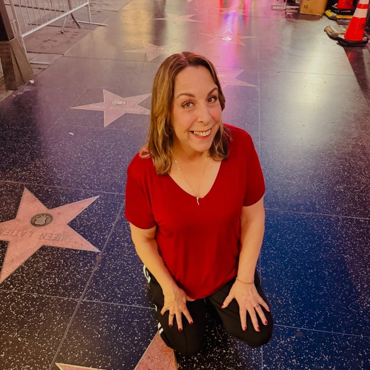 Kimberly Menzies smiling on the Hollywood Walk of Fame