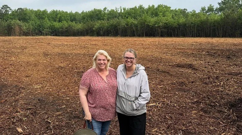 Janelle Brown with daughter Maddie on their North Carolina farm land