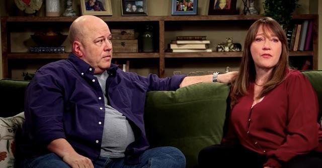 Mark and Patty Schrankel sitting on a couch