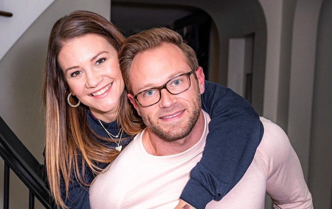 Adam and Danielle Busby smiling together