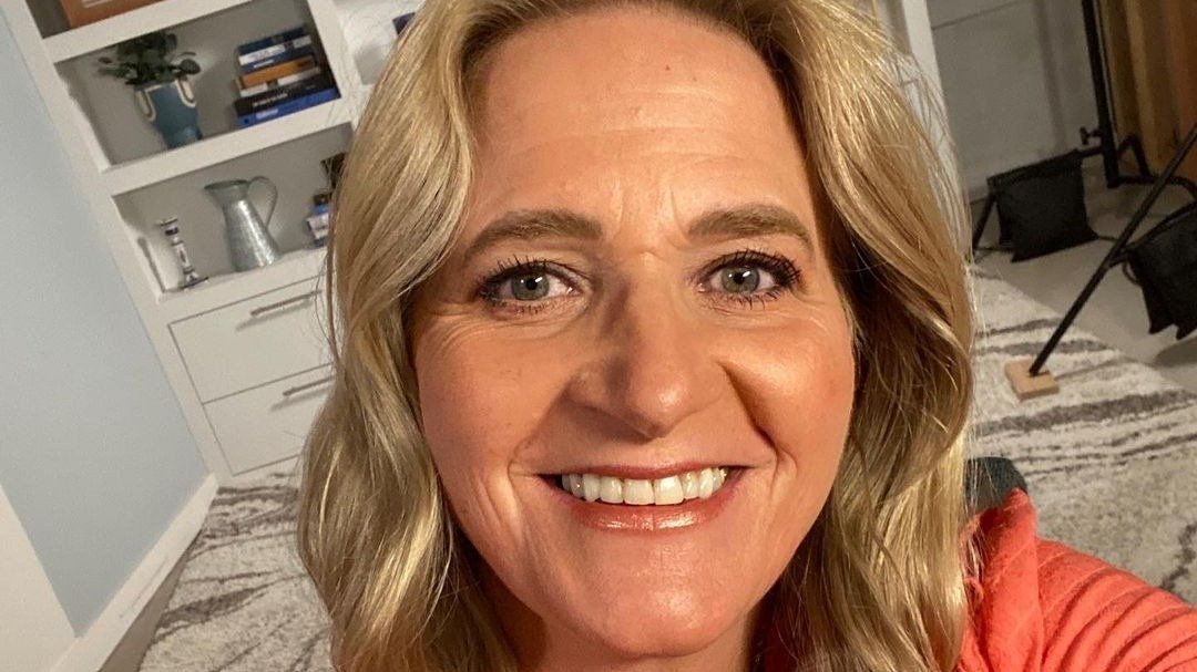Christine Brown Woolley smiling in a candid selfie