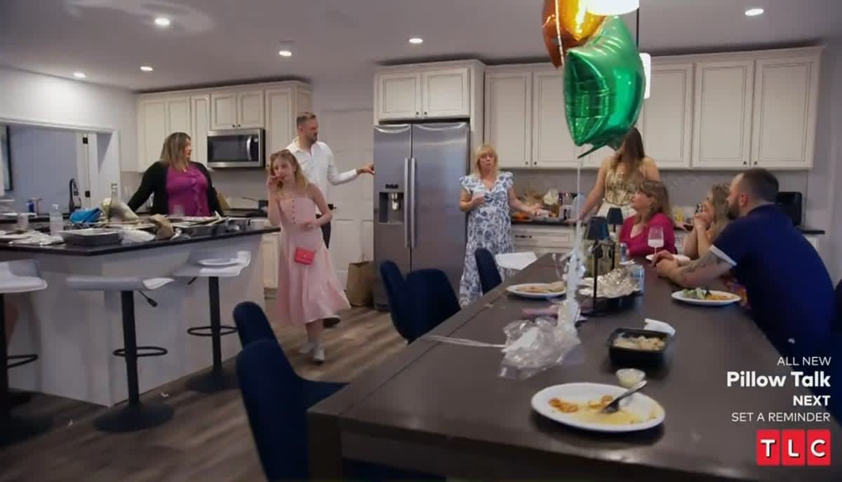 Tina, Josh and Janelle's family gathered in the Florida kitchen