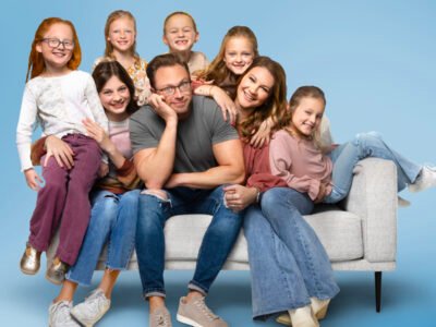 Adam and Danielle Busby with Blayke and the five quints posing together