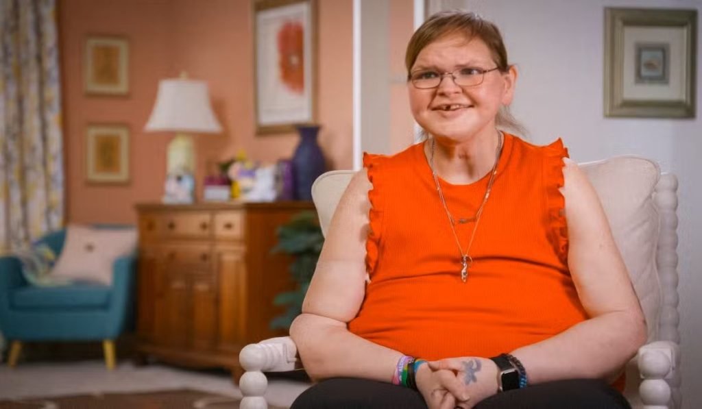 Tammy Slaton smiling in an orange top