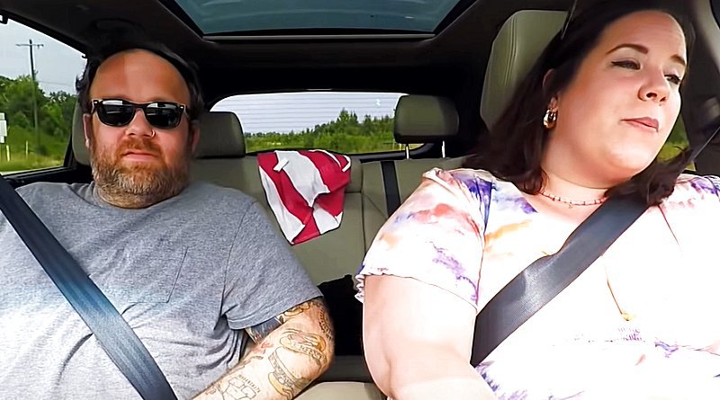 Buddy Bell and Whitney Thore in a car together