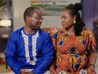 Niles Valentine and Matilda Nti smiling together in traditional attire