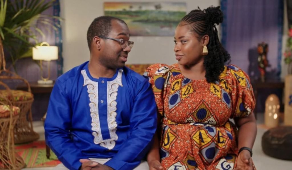 Niles Valentine and Matilda Nti smiling together in traditional attire