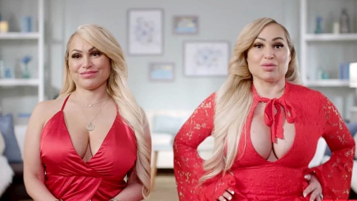 Darcey and Stacey Silva in red outfits