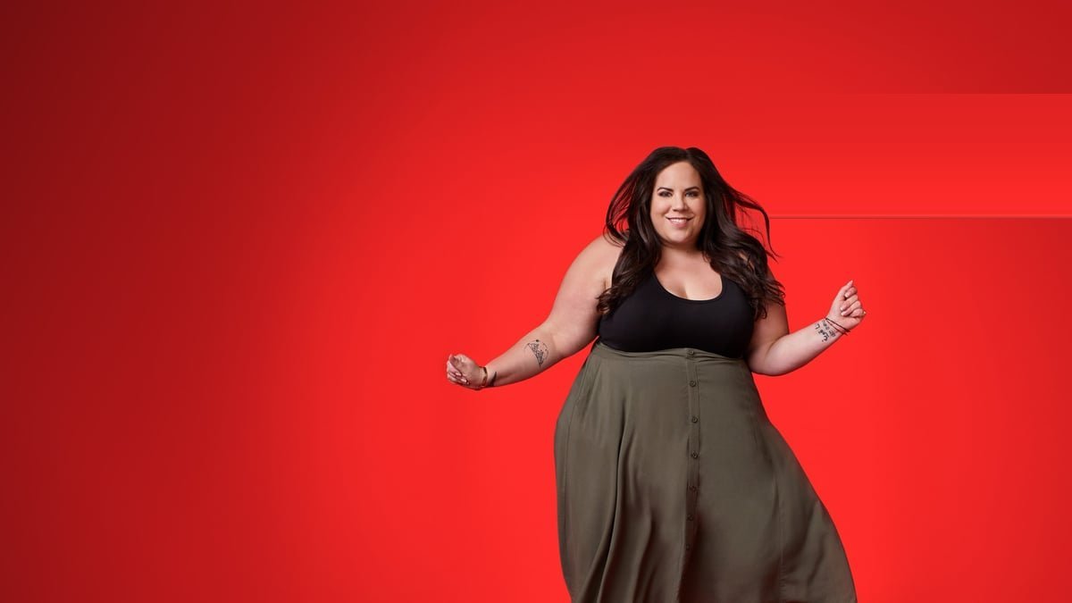 Whitney Way Thore dancing against a red background