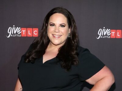 Whitney Way Thore smiling at a TLC event