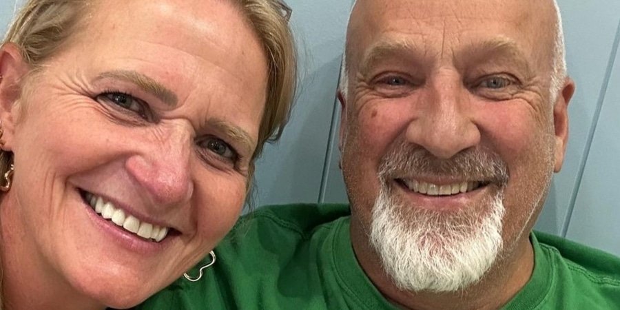 Christine Brown and David Woolley smiling in a selfie