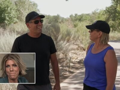 Meri Brown and Ron walking outdoors together