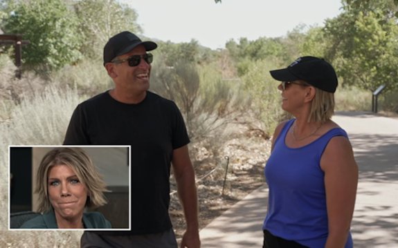Meri Brown and Ron walking outdoors together