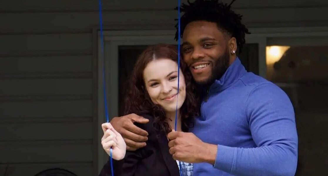 Lilly Bennett and Lawrence Bishop smiling together