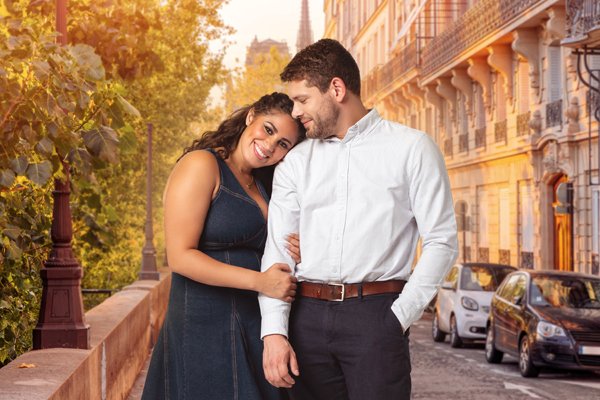 Zuri and Ben walking together on a street in France