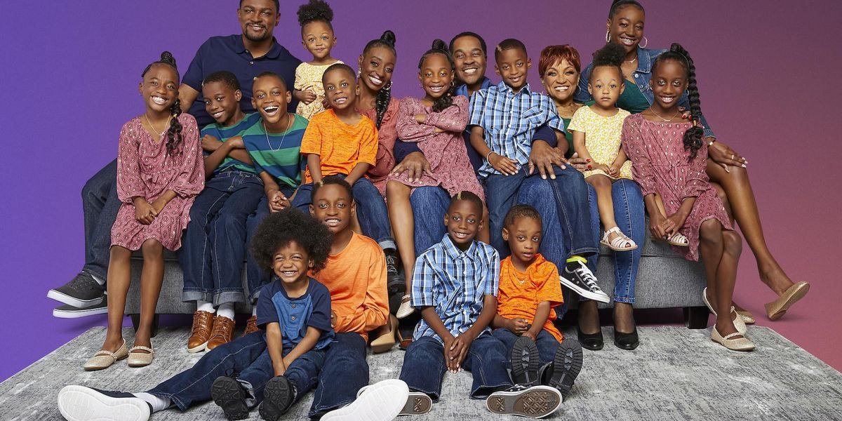 Deon and Karen Derrico with GG and their children posing together