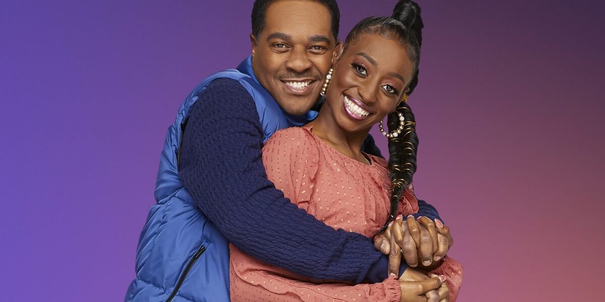 Deon Derrico hugging Karen Derrico and smiling