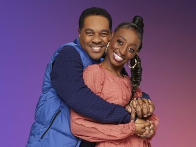 Deon Derrico hugging Karen Derrico and smiling