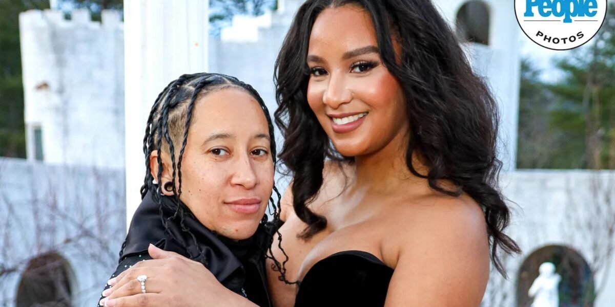 Chantel Everett and Ashley Bowen posing at the castle where Ashley proposed
