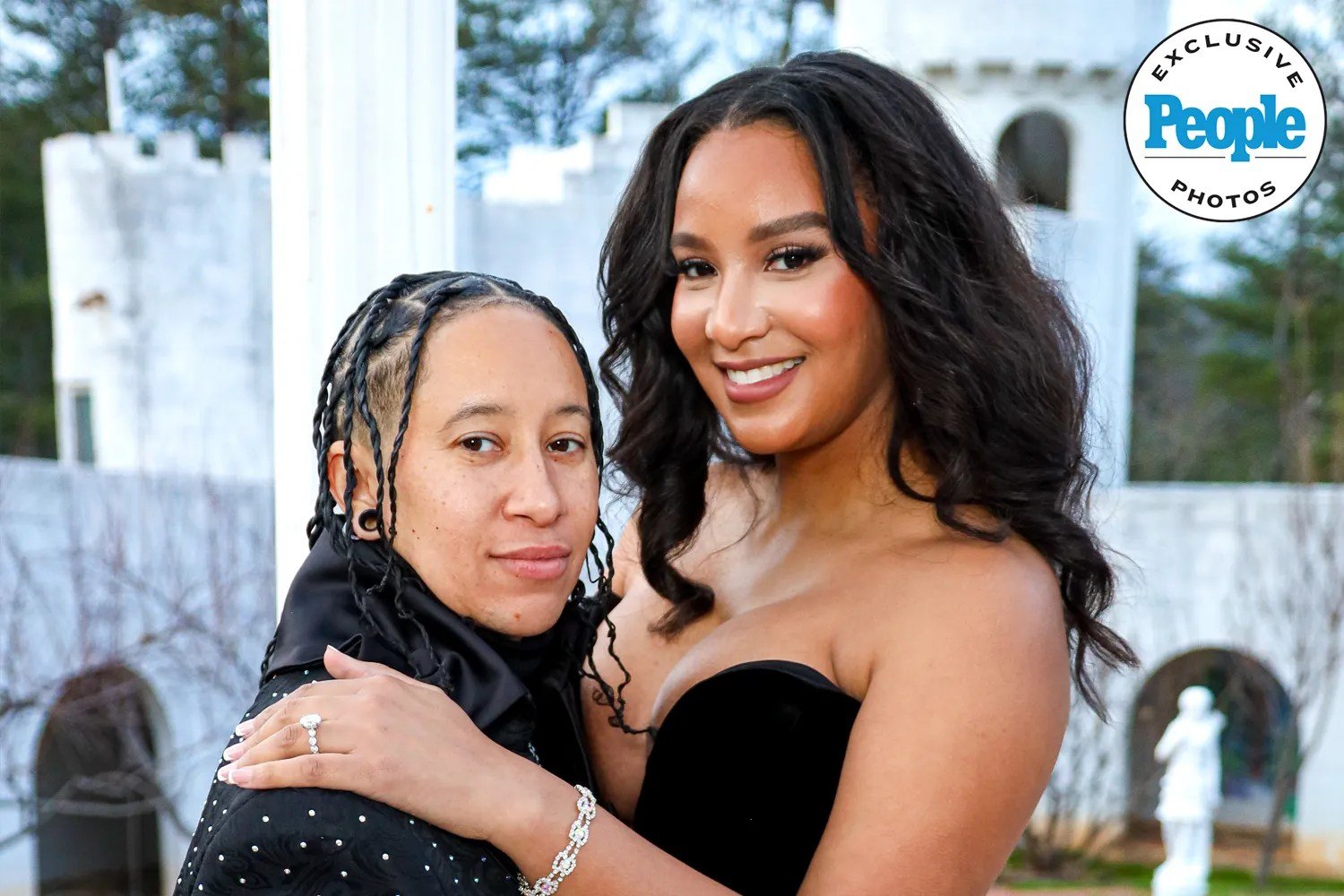 Chantel Everett and Ashley Bowen posing at the castle where Ashley proposed