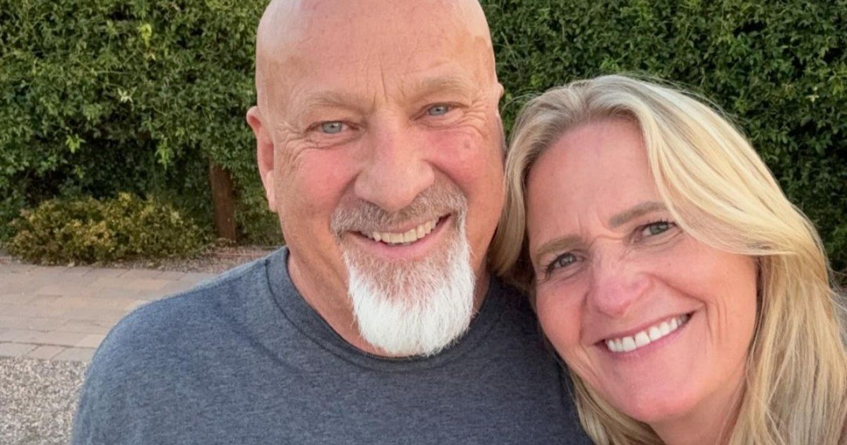 David Woolley and Christine Brown smiling selfie